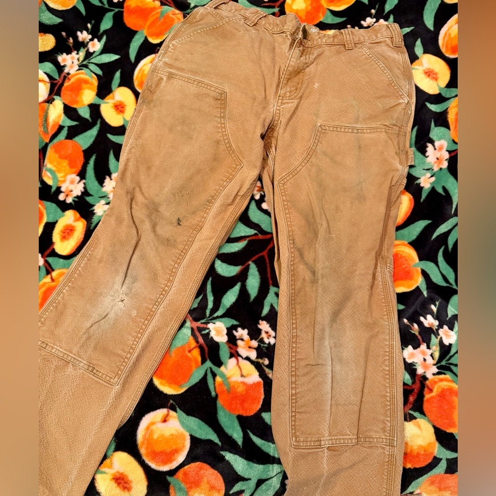 Worn in Carhartt pants